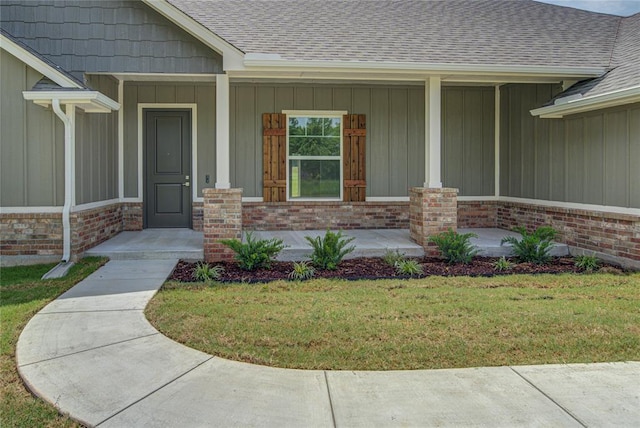 207 Hope Ave, Shawnee, OK 74804 - entrance to property featuring covered porch and board and batten siding
