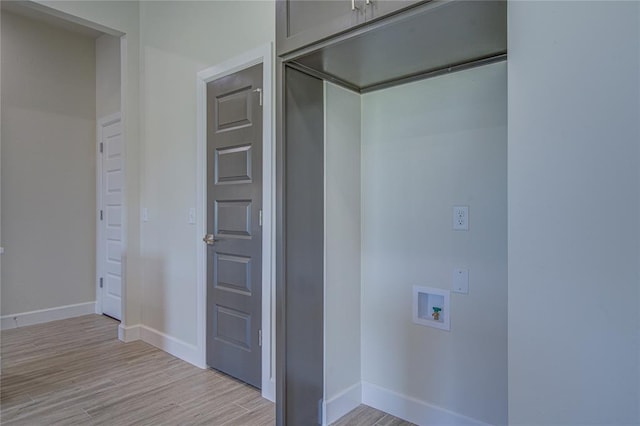 207 Hope Ave, Shawnee, OK 74804 - laundry area featuring light wood finished floors and hookup for a washing machine
