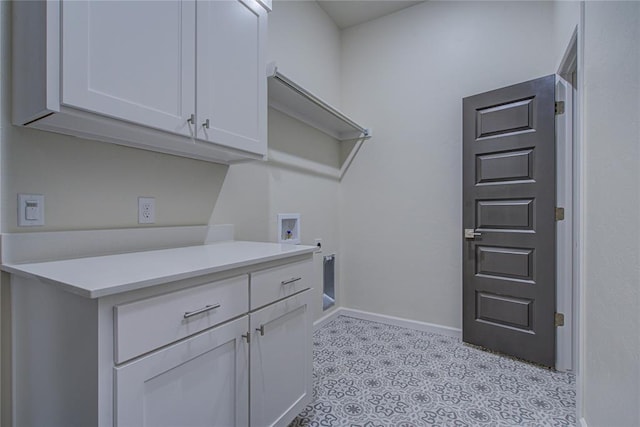 207 Hope Ave, Shawnee, OK 74804 - laundry room with cabinet space, hookup for a washing machine, and electric dryer hookup