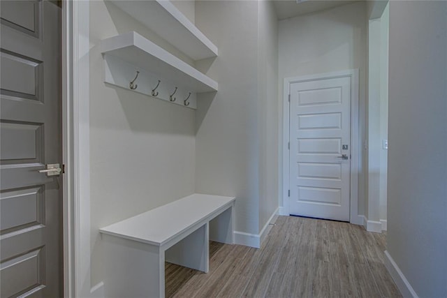 207 Hope Ave, Shawnee, OK 74804 - mudroom with baseboards and wood finished floors