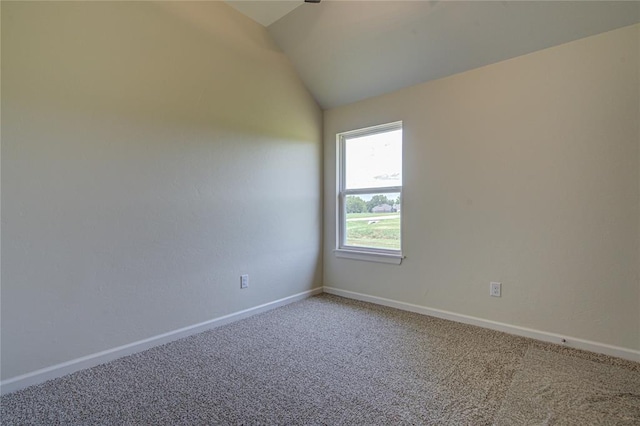207 Hope Ave, Shawnee, OK 74804 - unfurnished room with carpet flooring and vaulted ceiling