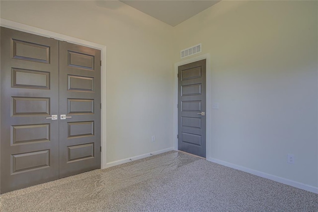 207 Hope Ave, Shawnee, OK 74804 - carpeted entryway featuring baseboards
