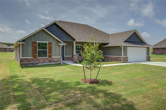 207 Hope Ave, Shawnee, OK 74804 - craftsman-style house with board and batten siding, driveway, an attached garage, and a front lawn