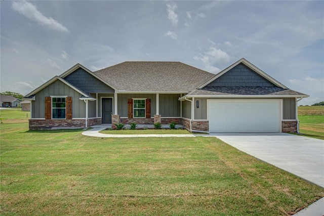 207 Hope Ave, Shawnee, OK 74804 - craftsman-style home with board and batten siding, a garage, and a front lawn