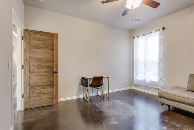 living area with ceiling fan and a wealth of natural light