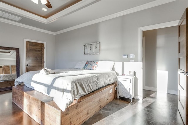 bedroom featuring ornamental molding, ceiling fan, and a tray ceiling