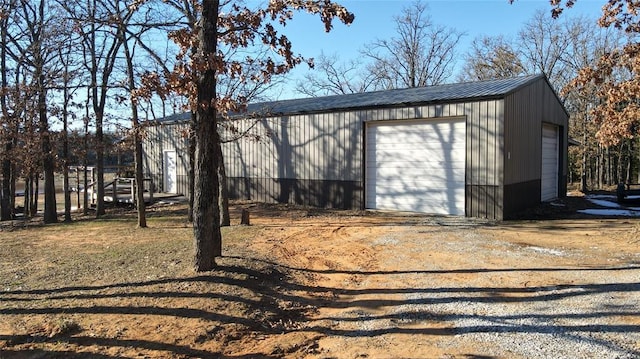 view of outbuilding featuring a garage