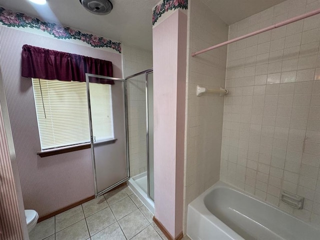 bathroom featuring toilet and tile patterned floors