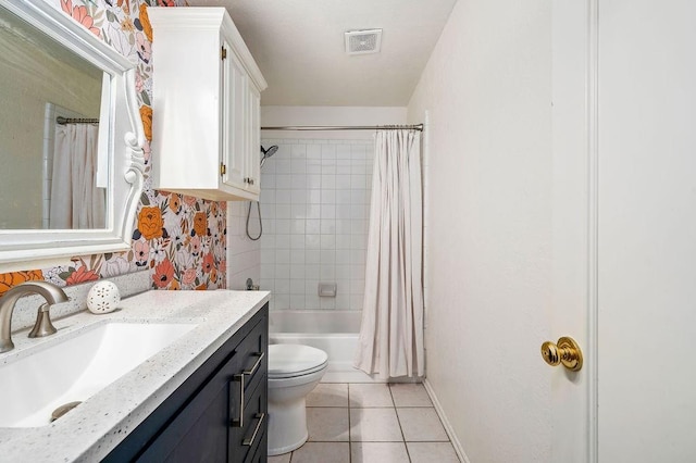 full bathroom with shower / bathtub combination with curtain, tile patterned flooring, vanity, and toilet