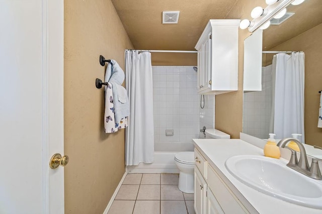 full bathroom featuring shower / bathtub combination with curtain, vanity, tile patterned floors, and toilet