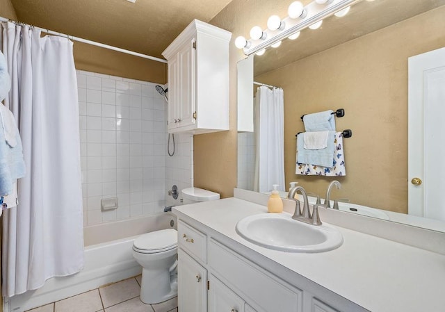 full bathroom with toilet, shower / bath combination with curtain, tile patterned floors, and vanity