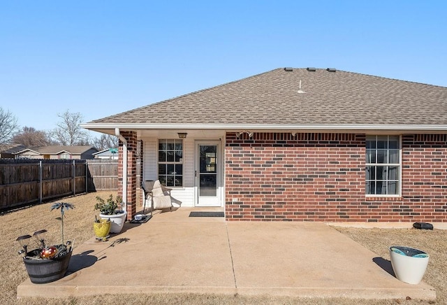 back of property featuring a patio area