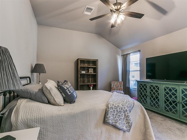 carpeted bedroom featuring ceiling fan and lofted ceiling