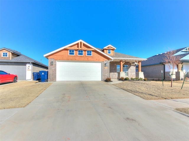 view of front of house with a garage and covered porch