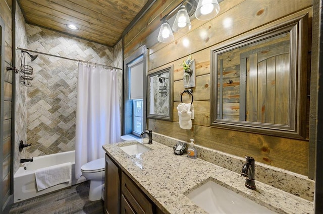 full bathroom with shower / bathtub combination with curtain, vanity, wooden ceiling, and toilet