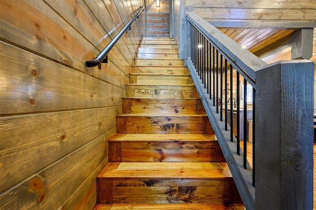 stairway with wooden walls