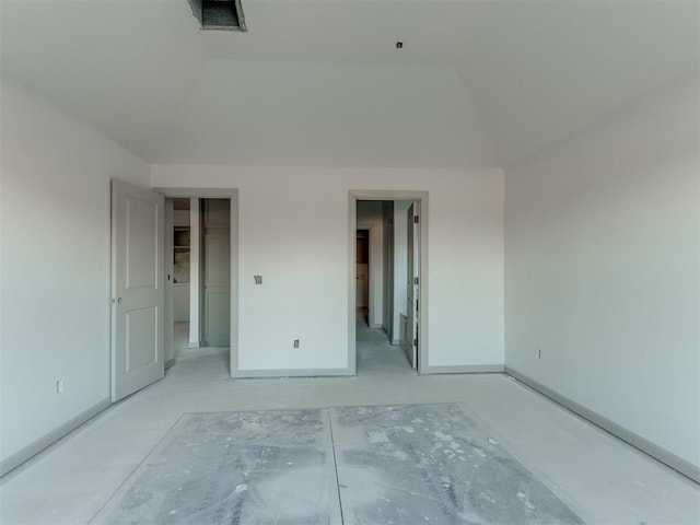 unfurnished bedroom featuring vaulted ceiling