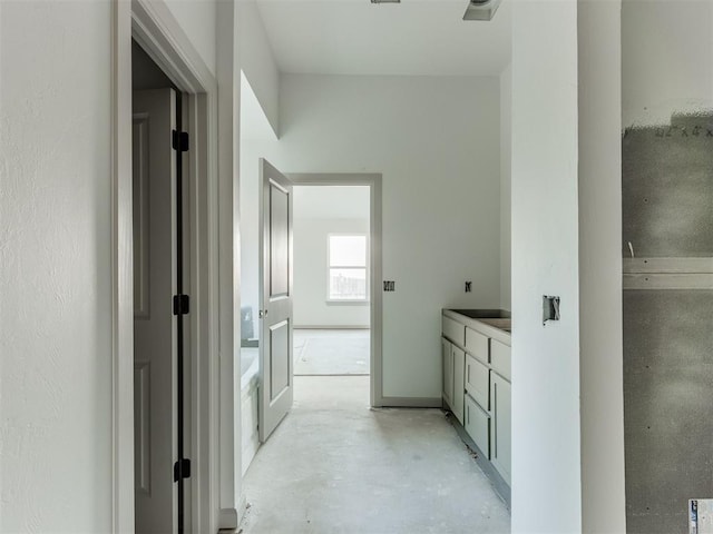 bathroom featuring vanity and concrete floors