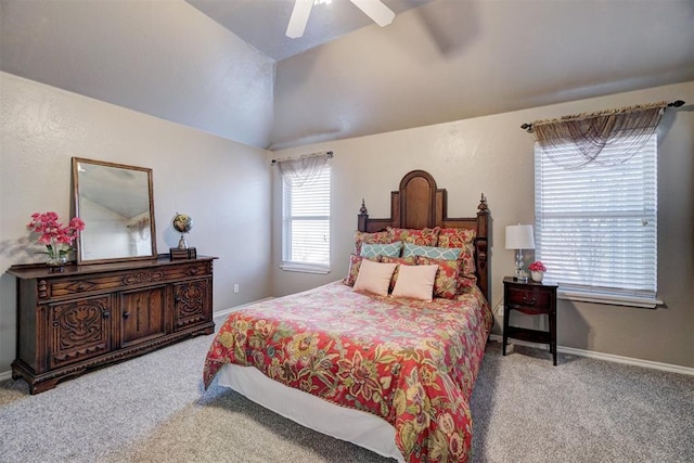 bedroom with light colored carpet, ceiling fan, and vaulted ceiling