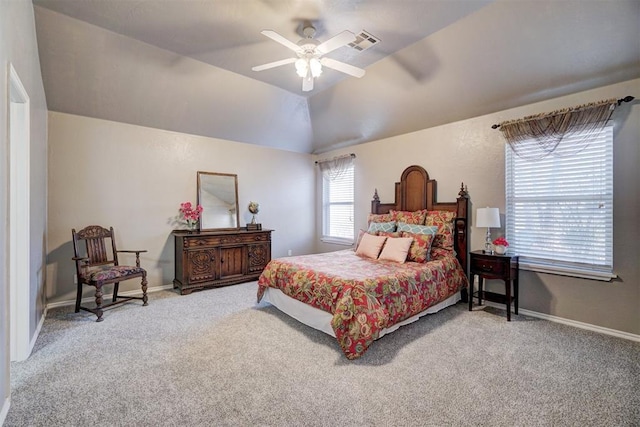 carpeted bedroom with lofted ceiling and ceiling fan