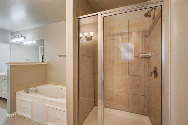 bathroom with shower with separate bathtub and tile patterned floors