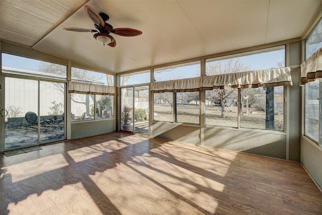 sunroom with vaulted ceiling and ceiling fan