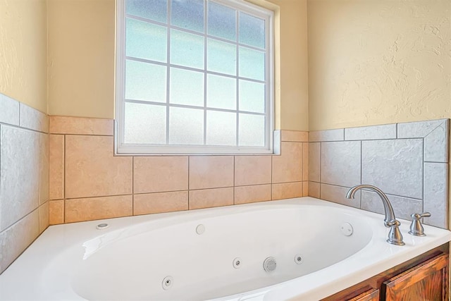 bathroom with a washtub