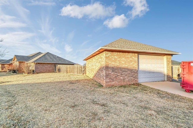 view of side of property featuring a garage