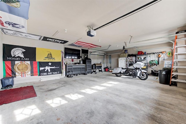 garage featuring a garage door opener