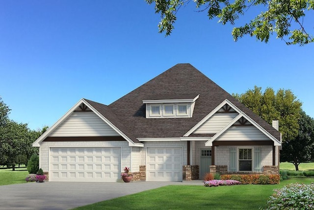 view of front of property with a front lawn and a garage