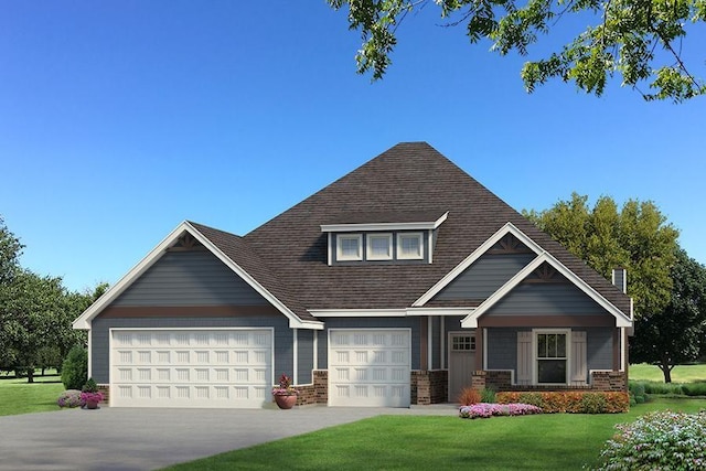 craftsman-style house featuring a garage and a front lawn