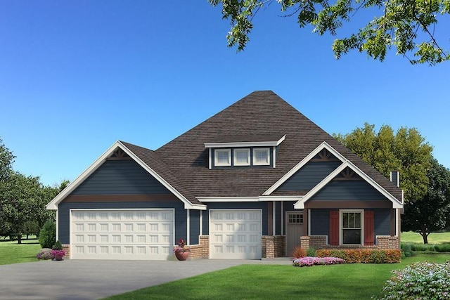 view of front of house with a front lawn and a garage