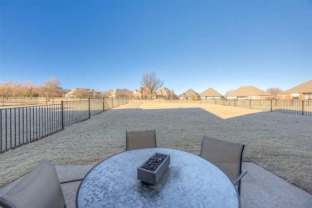 view of yard with a fire pit