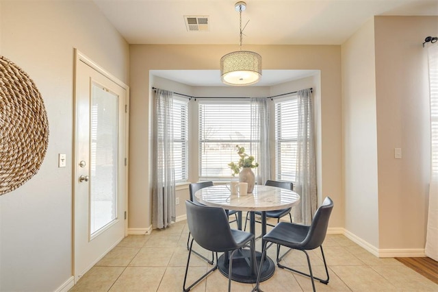 view of tiled dining space