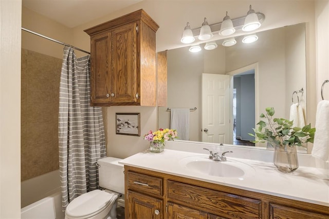 full bathroom featuring toilet, shower / bathtub combination with curtain, and vanity