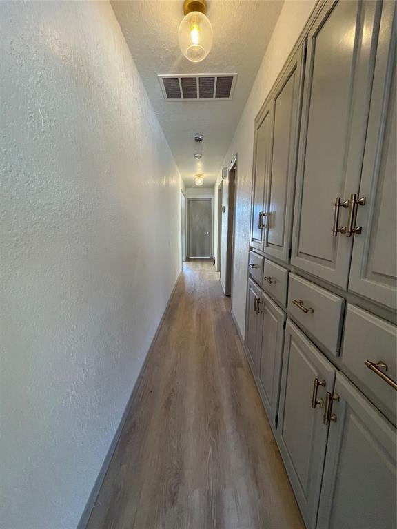 hallway featuring light wood-type flooring