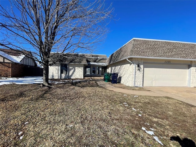 view of side of home with a garage