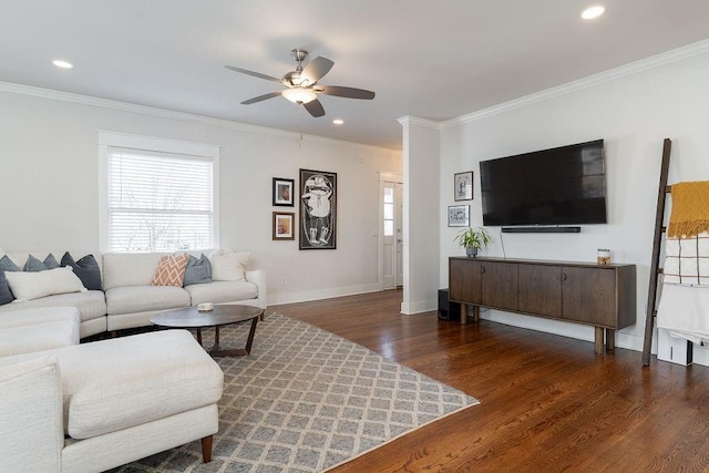 living room featuring dark hardwood / wood-style flooring, ornamental molding, and ceiling fan