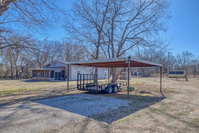 view of yard featuring a carport