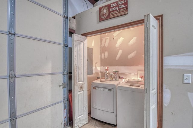 clothes washing area with independent washer and dryer