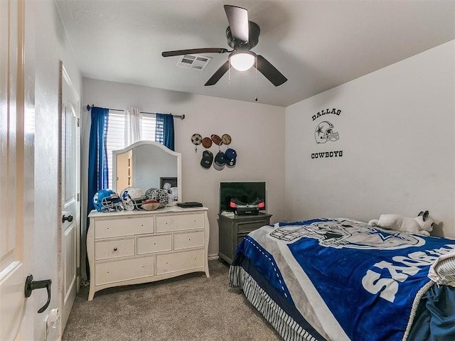 carpeted bedroom featuring ceiling fan