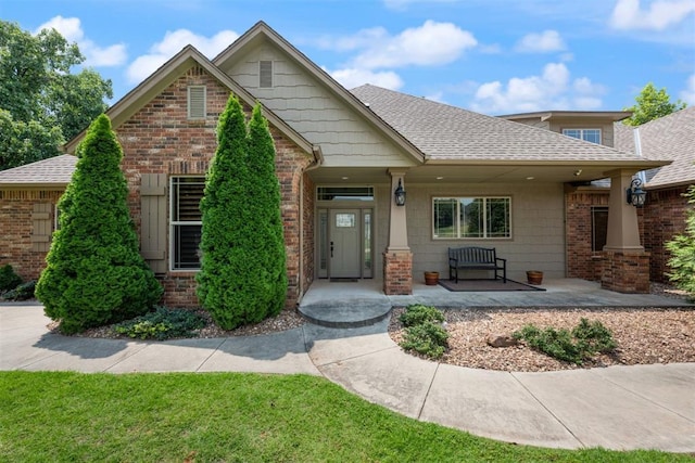 craftsman-style home with a front lawn