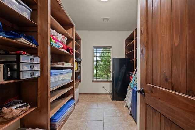 interior space with light tile patterned floors