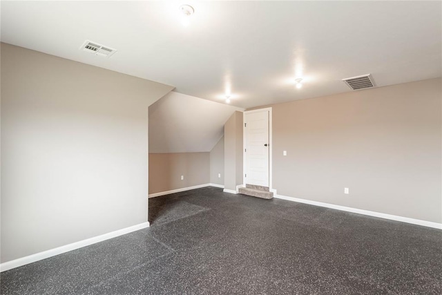 bonus room featuring vaulted ceiling