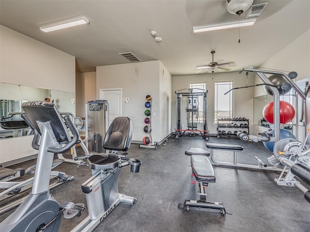 exercise room with ceiling fan