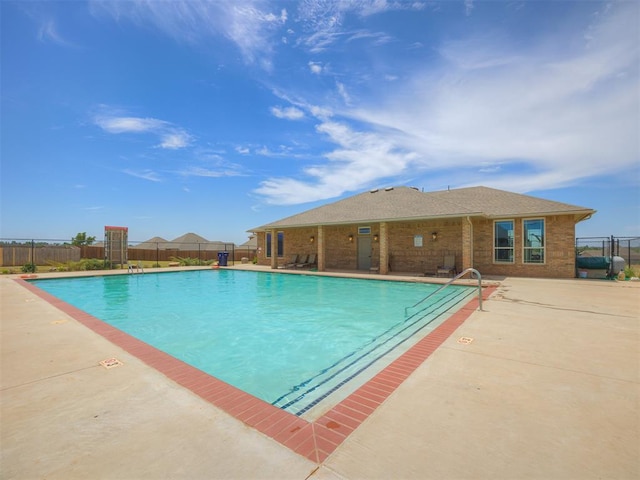 view of pool featuring a patio