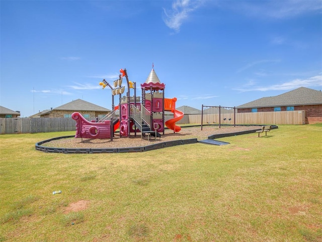 view of playground featuring a lawn