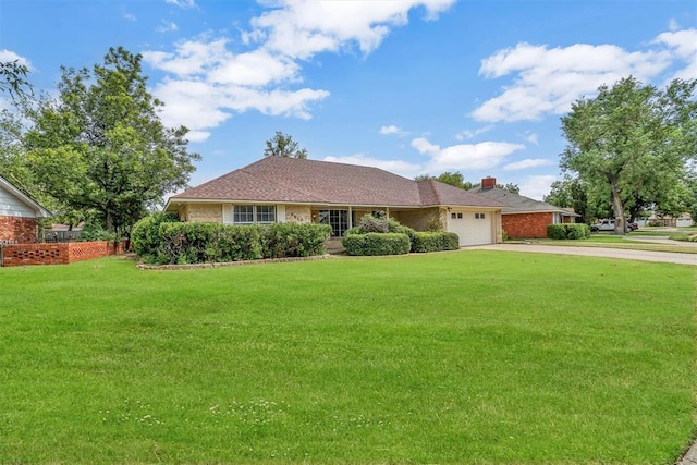 single story home featuring a front lawn and a garage