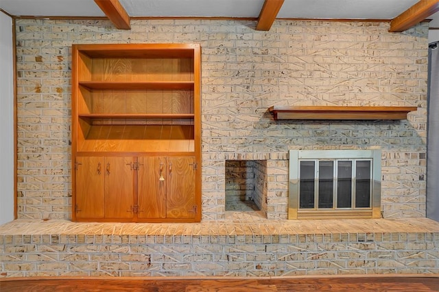 interior details featuring beam ceiling and wood-type flooring