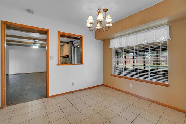 tiled spare room featuring ceiling fan with notable chandelier and beamed ceiling